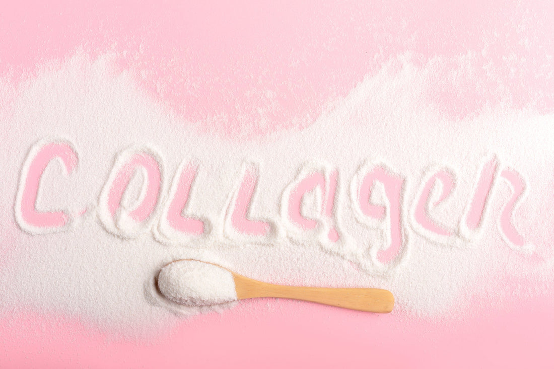 Collagen or protein in powder format on pink background. Beauty supplement.