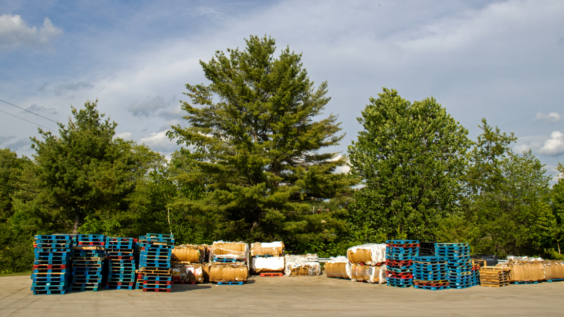 Wood pallets and cardboard for recycling 